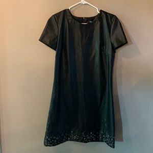 Perfect dress for concerts. Metal circles across the bottom hem are edgy